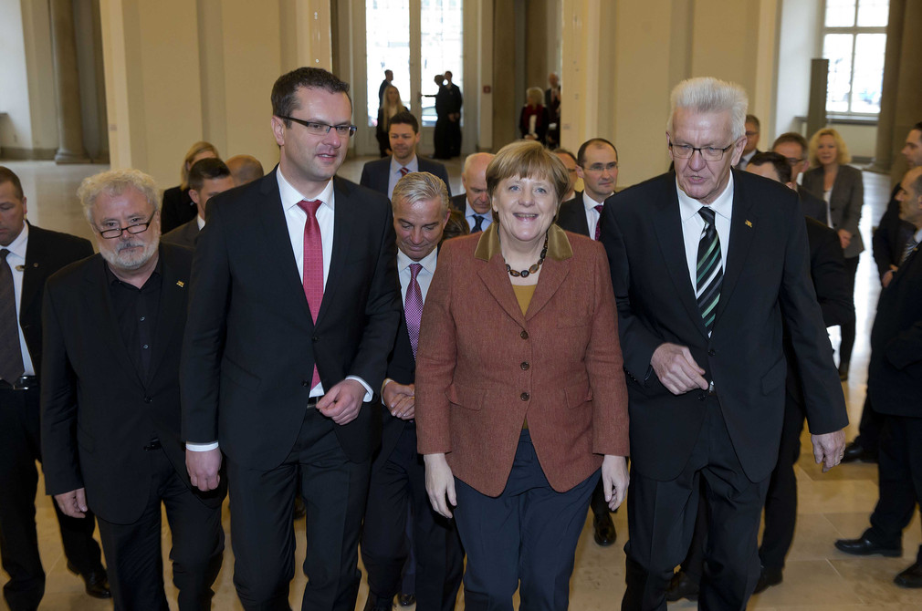 Der Rottenburger Oberbürgermeister Stephan Neher (l.), Bundeskanzlerin Angela Merkel (M.) und Ministerpräsident Winfried Kretschmann (r.)