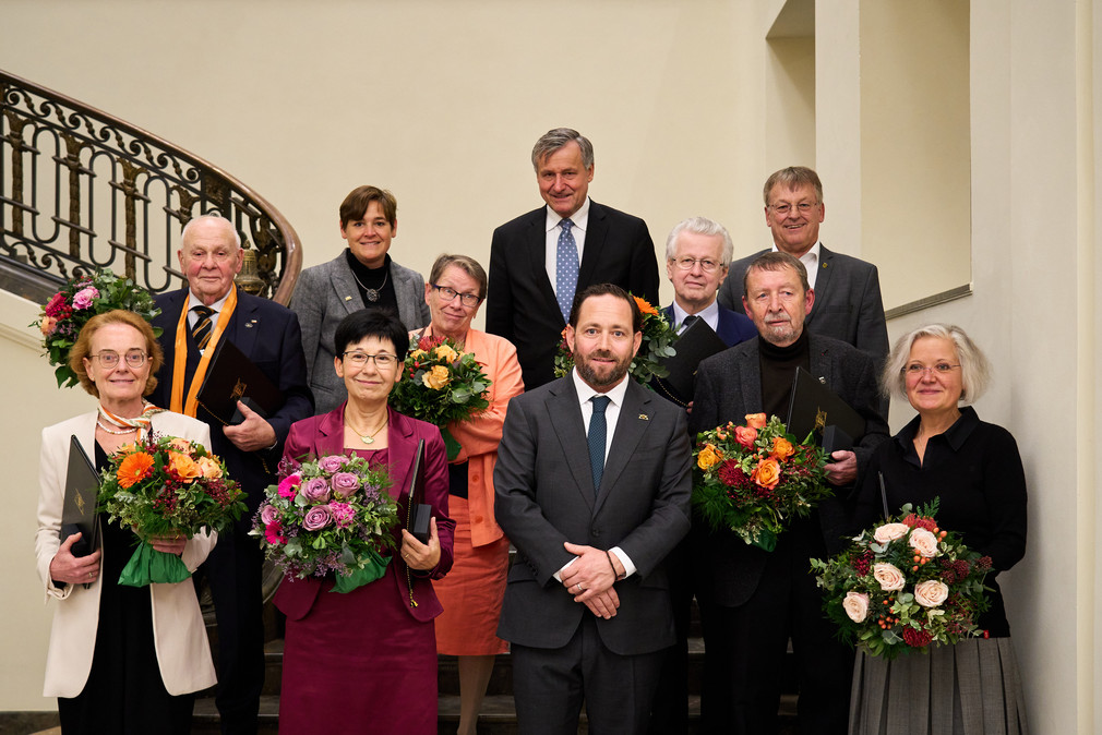 Gruppenbild mit Staatssekretär Florian Hassler und den Geehrten
