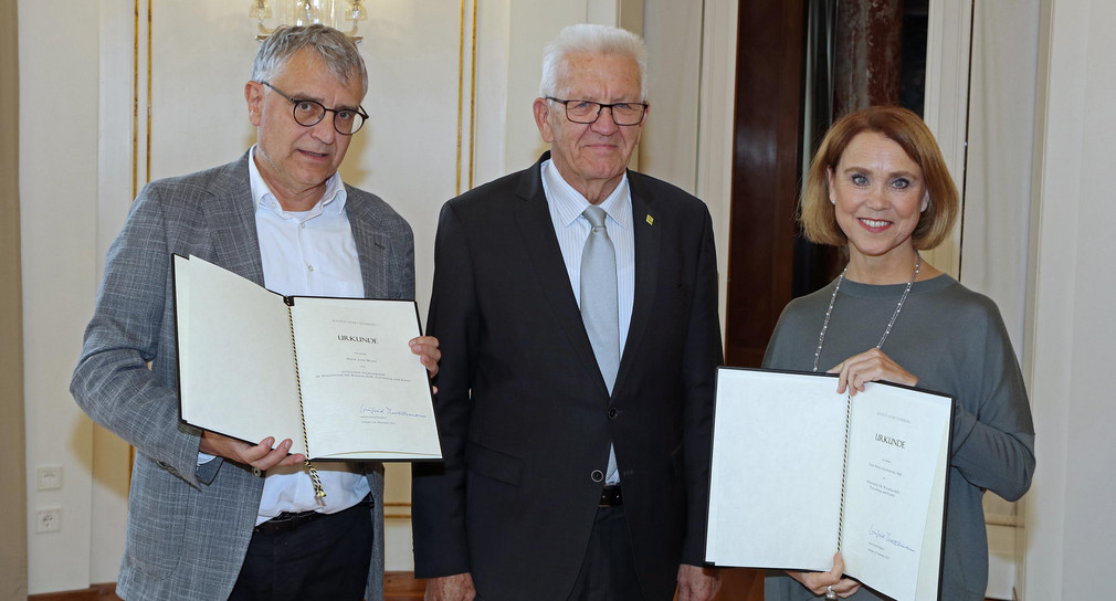 Staatssekretär Arne Braun (links), Ministerpräsident Winfried Kretschmann (Mitte) und Ministerin Petra Olschowski (rechts)
